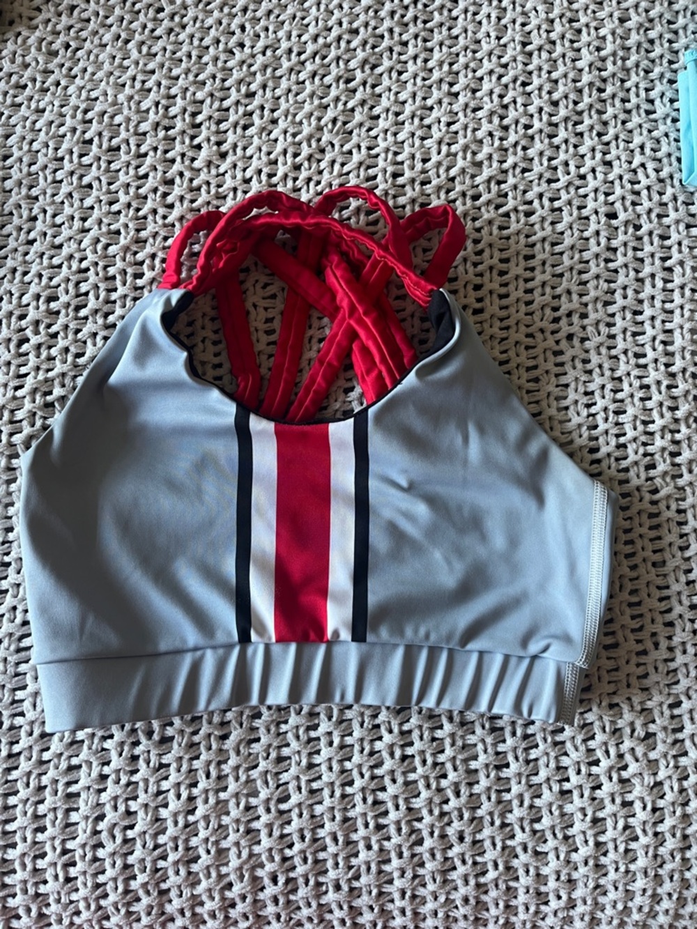 Ohio State sports bra. Crossed back.